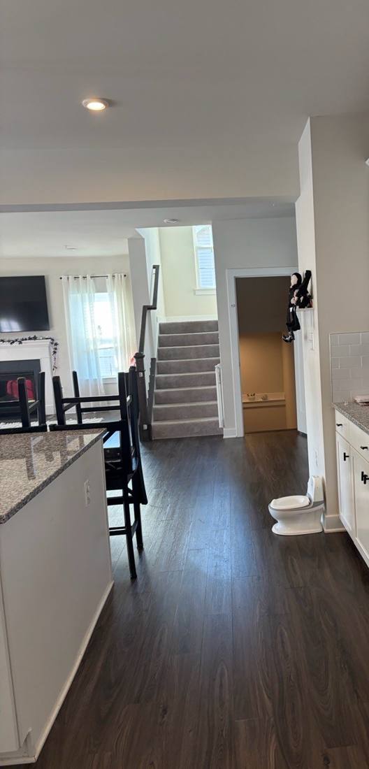 Kitchen, dining area and stairs after a deep clean