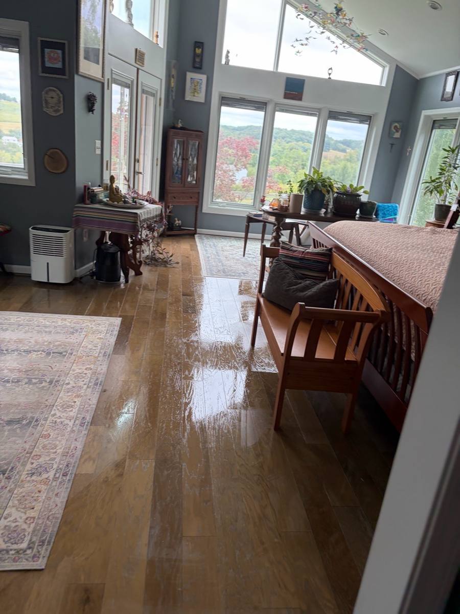 Hardwood floor mopped to a shine during a home cleaning in central Maryland